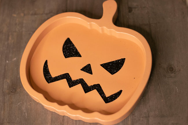 Cement Jack O Lantern Tray with glitter.